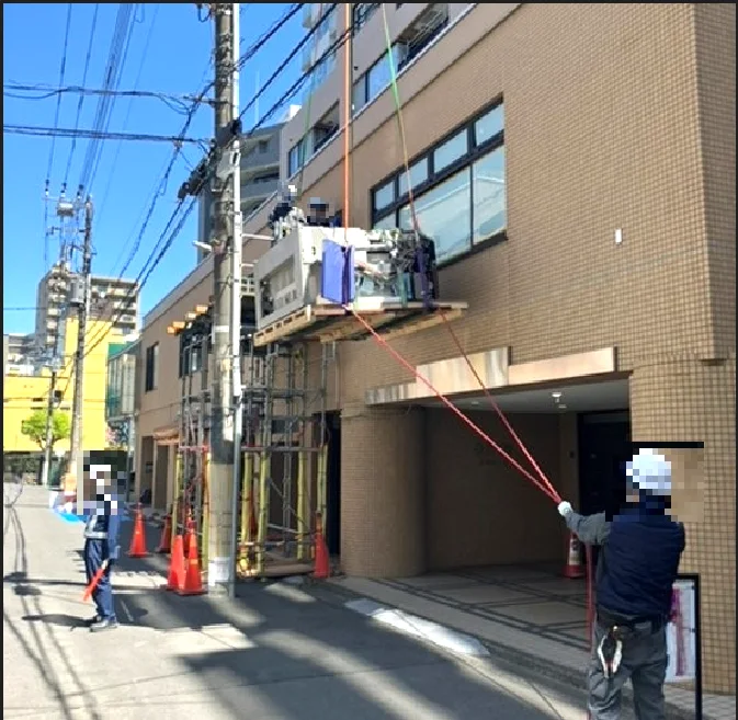 CT extracted through the window by crane
