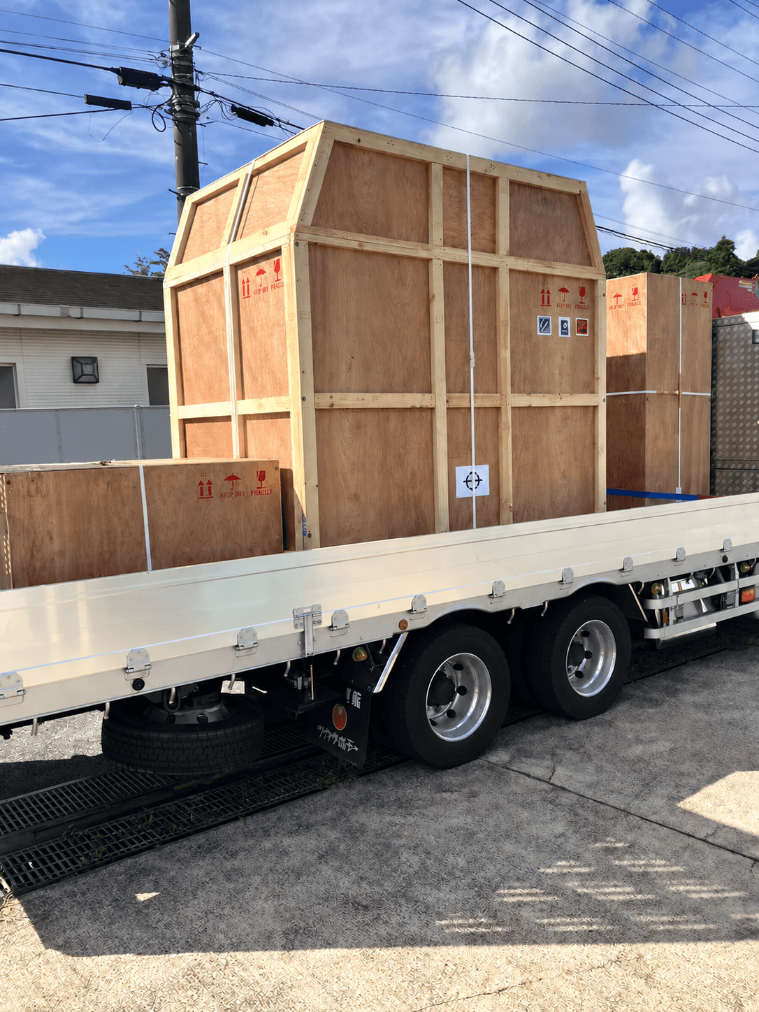 Air-freight crates loaded on a trailer