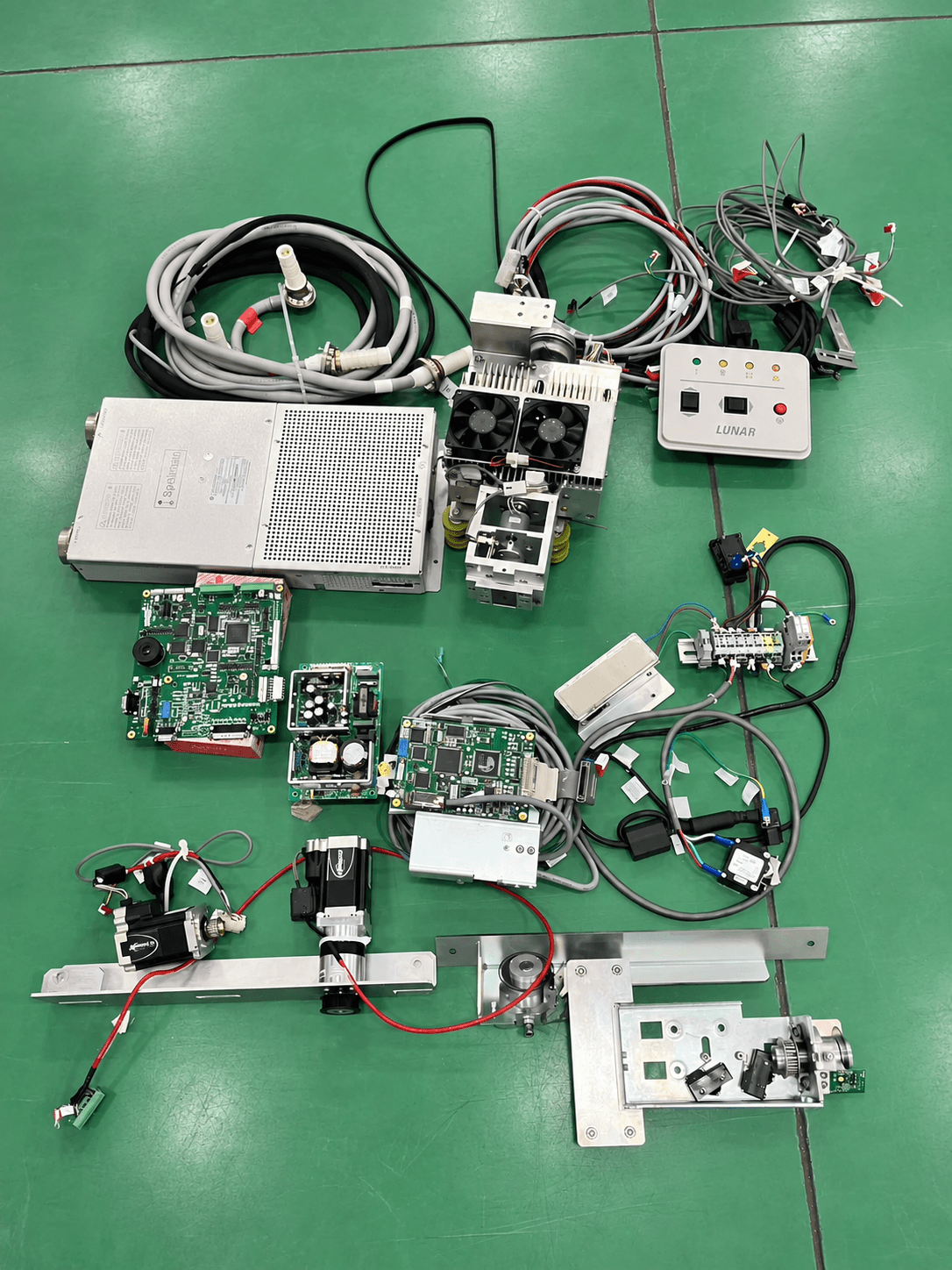Boards and components laid out for inspection