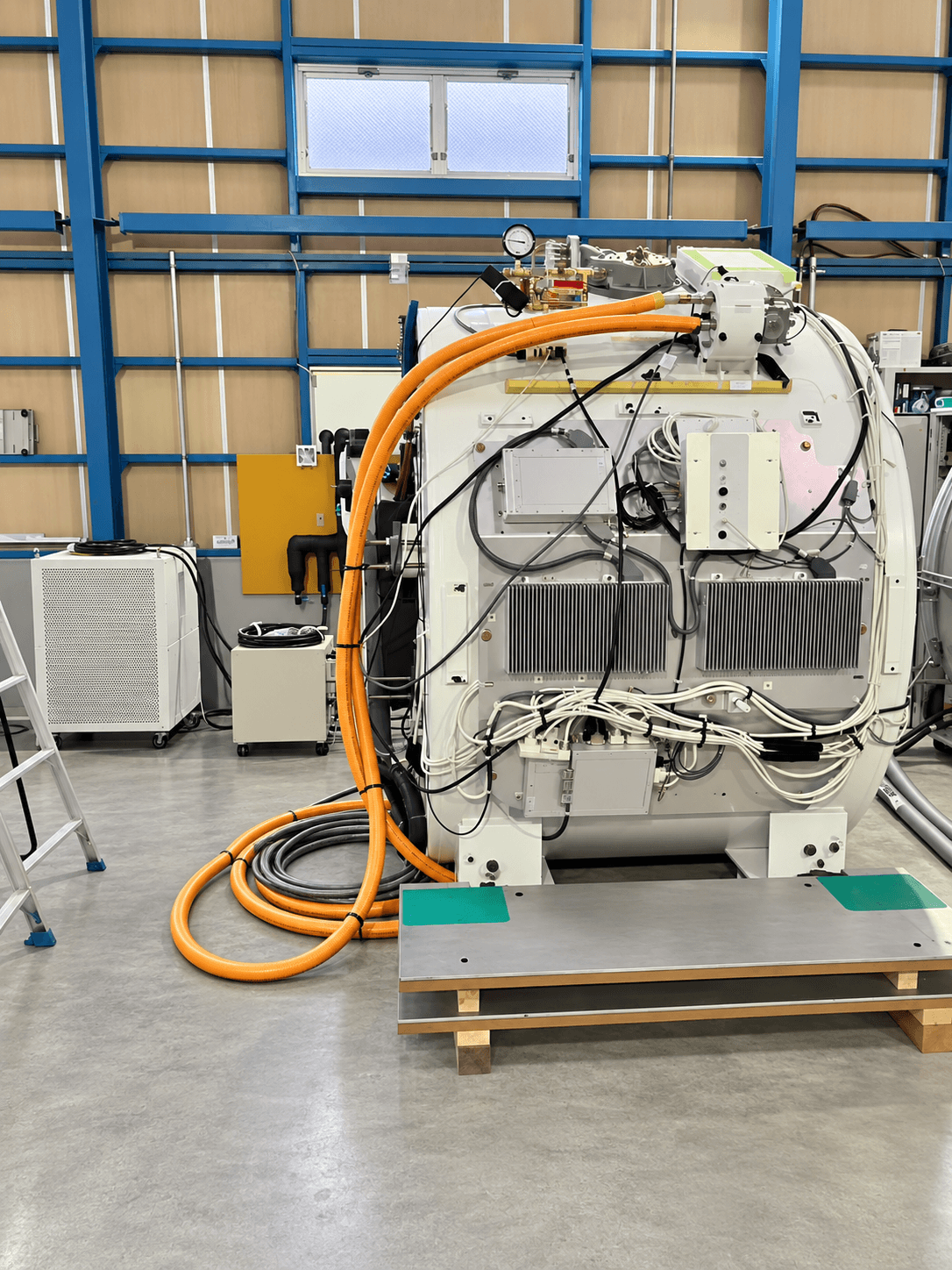 An MRI magnet with cooling lines connected