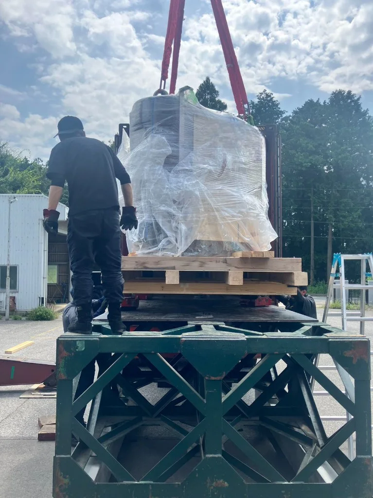 Moving cargo into the container