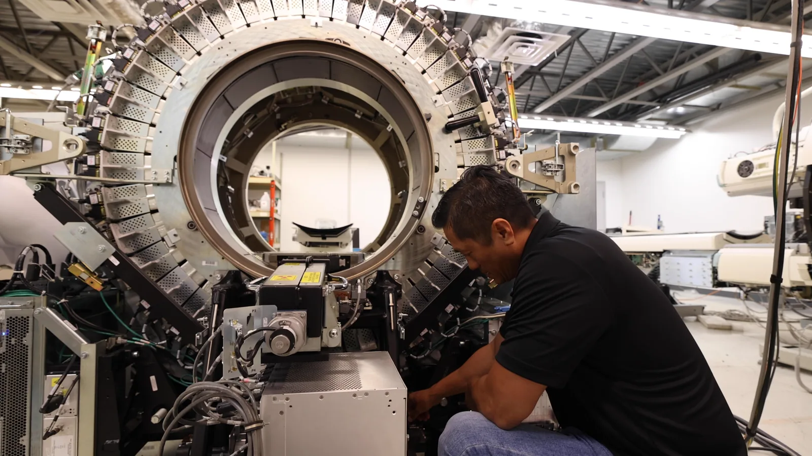 Open imaging system being inspected and serviced